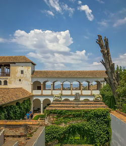 View of building against cloudy sky