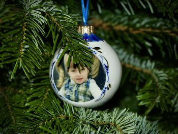 Close-up of a girl with christmas tree