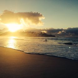 Scenic view of sea at sunset