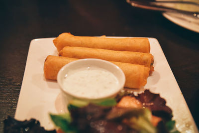 Close-up of food served on table