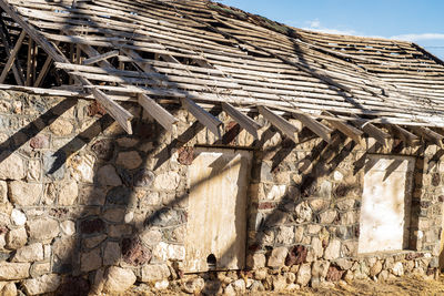 Low angle view of roof of building stone walls of bathhouse