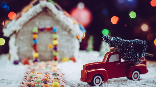 Close-up of toy car with christmas tree
