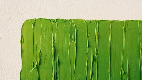 Close-up of green paint on wall