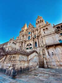 Low angle view of temple against building