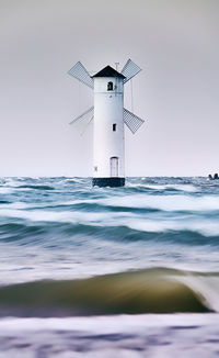 View of lighthouse in sea