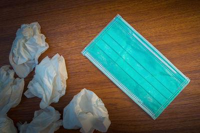 High angle view of paper on table