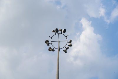 Low angle view of street light against sky