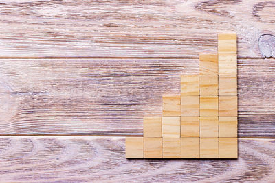 High angle view of stone stack on wooden table