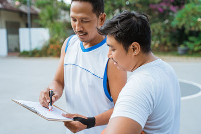 Young man using mobile phone