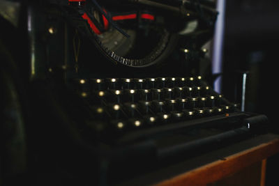 Close-up of old machinery at table