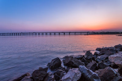 Scenic view of sea against sky during sunset