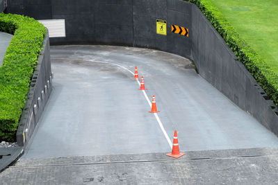 High angle view of arrow sign on road
