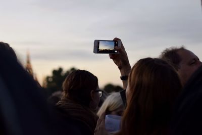 Woman photographing through camera