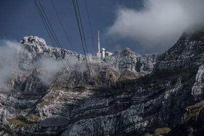 Low angle view of panoramic shot of mountains against sky