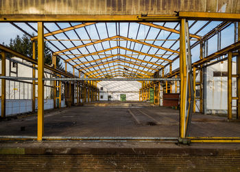 Old fabric hall in city against sky