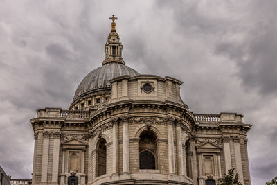 Low angle view of cathedral against cloudy sky