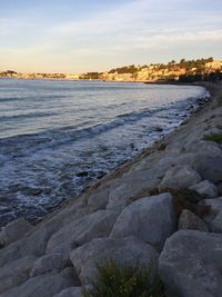 Scenic view of sea against sky during sunset