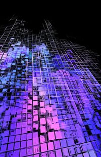 Low angle view of illuminated lights against blue sky at night