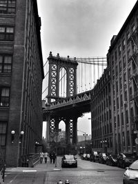 City seen through arch bridge