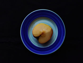 High angle view of fruits in plate on table