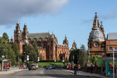 Buildings in city against sky