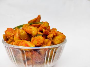 Close-up of food in bowl against white background