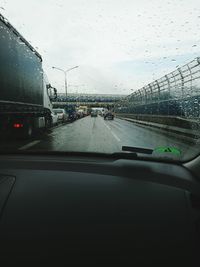 Road seen through car windshield