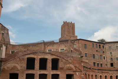 Low angle view of old building against sky