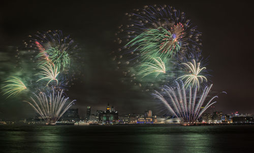 Firework display at night