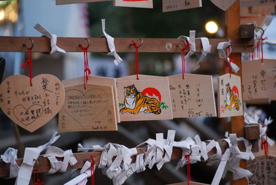 Close-up of text hanging on paper