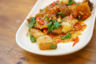 Close-up of food in plate on table