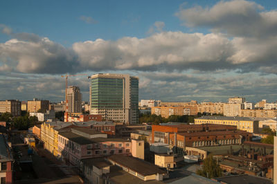 High angle view of buildings in city against sky