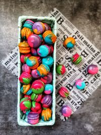 High angle view of multi colored candies on shelf