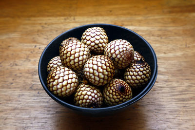 High angle view of eggs in bowl on table