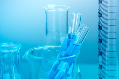 Close-up of blue chemical in container at laboratory