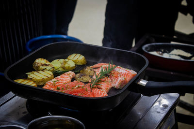 Close-up of seafood getting cooked