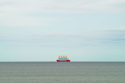 View of ship at sea against sky