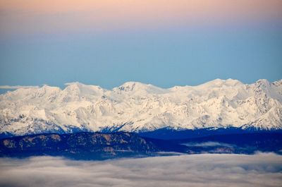 Scenic view of mountains against clear blue sky