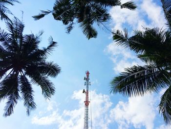 Low angle view of communications tower against sky