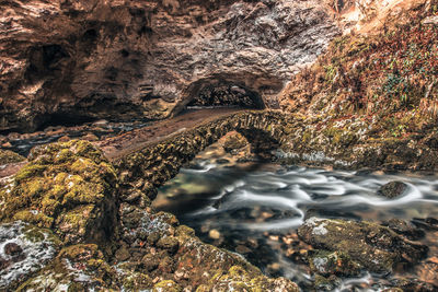 Stream flowing through rocks