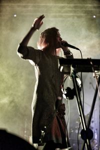 Low angle of a woman singer on stage