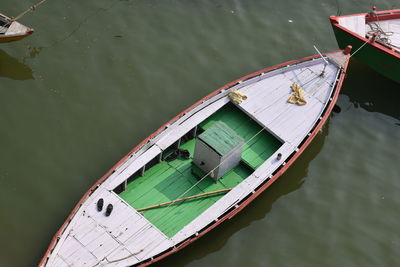 High angle view of boat floating on lake