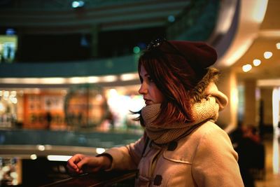 Close-up of young woman looking away