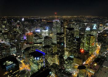 Aerial view of illuminated cityscape at night