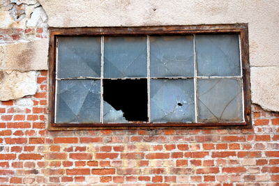 Close-up of window on wall of building