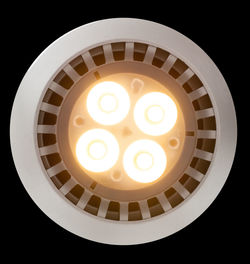 Low angle view of illuminated light bulb