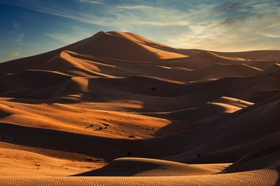 Aerial view of desert against sky