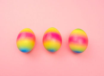 Close-up of multi colored candies against white background