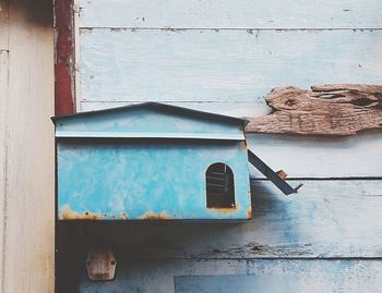 Old house against blue wall