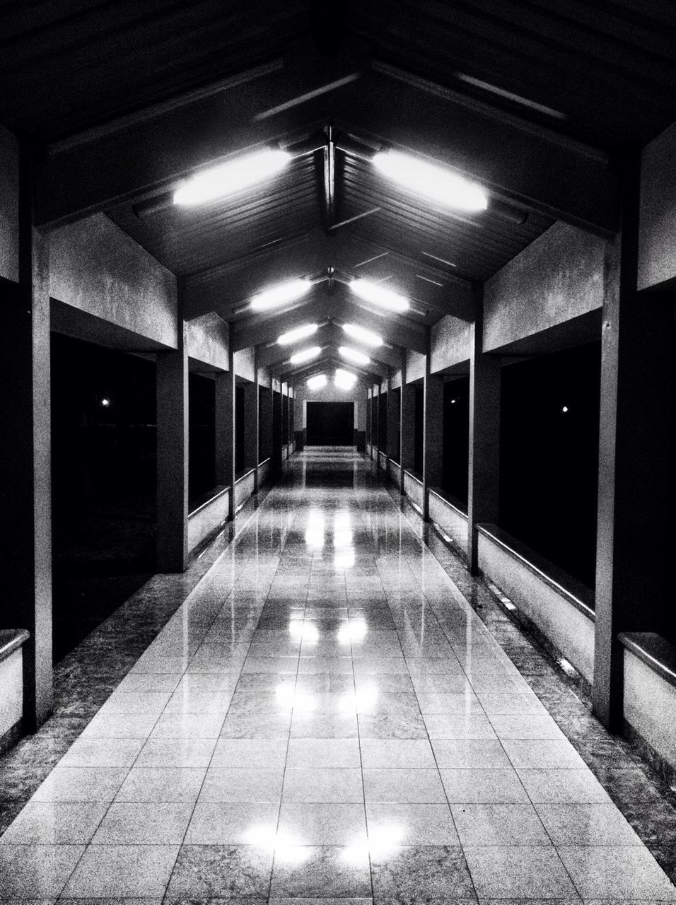 the way forward, illuminated, indoors, architecture, diminishing perspective, built structure, empty, corridor, ceiling, lighting equipment, flooring, night, vanishing point, absence, tiled floor, walkway, long, no people, building, narrow